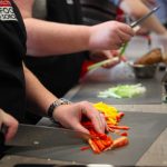 image of chopping veg at Food Sorcery Cooking Together foodie event Didsbury