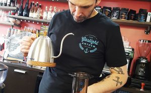 image of Barista Gavin ready to pour into Aeropress Coffee Maker using gooseneck kettle