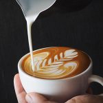 image of pouring coffee to make late art at Food Sorcery barista school Didsbury