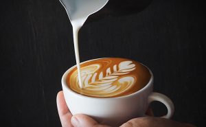 image of pouring coffee to make late art at Food Sorcery barista school Didsbury