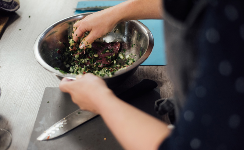 Image of Fit Food Class marinating chimichurri steak at Food Sorcery, Didsbury