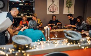 Image of Fit Food Class at the dining table enjoying their meal at Food Sorcery, Didsbury