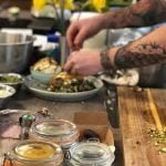 image of Dan Barber creating a fine dining meal in a box to finish at home. The cookery school Manchester