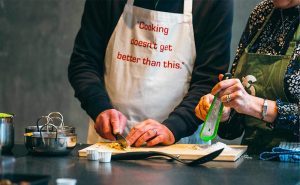 image of cooking together experiences at food sorcery cookery school Manchester