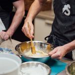 image of cooking together at Food Sorcery cookery school Italian Thai Korean Japanese