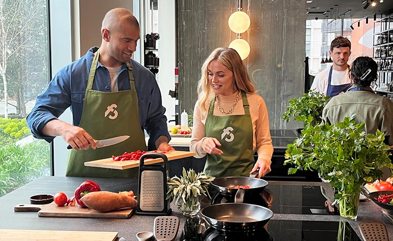 image of couple cooking together at Food Sorcery Manchester, things to do