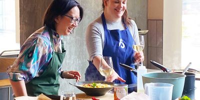 image of couple cooking together at Food Sorcery Manchester, things to do