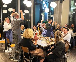team-building-cheers-at-Deansgate-Square-cookery-school image of cheers at team building at Food Sorcery cookery school New Jackson at Deansgate Square Manchester